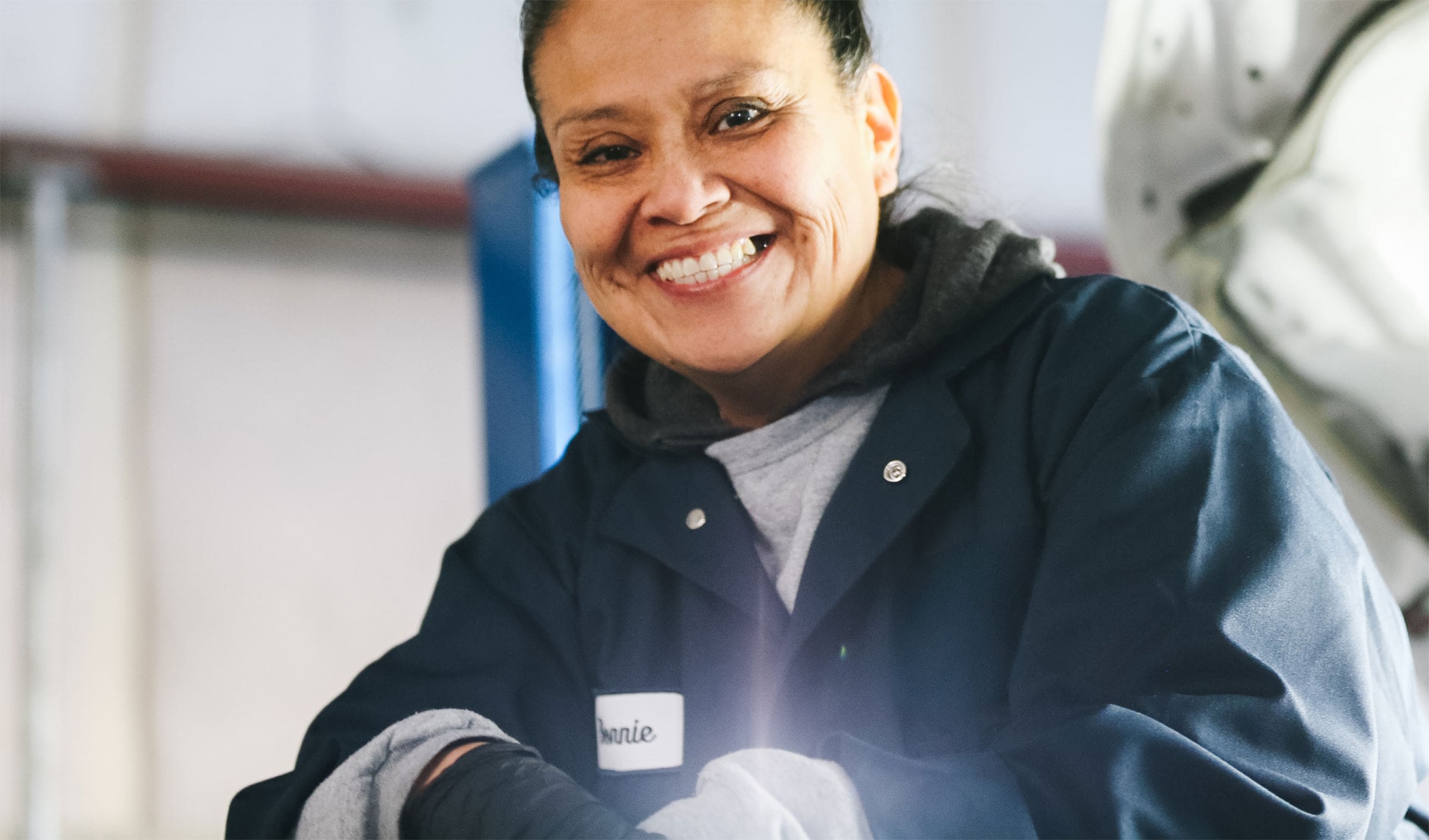 Smiling employee in work outfit