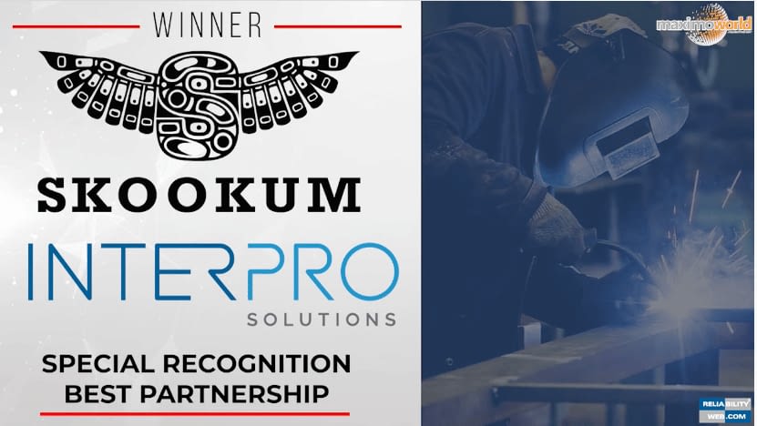 Award graphic announcing Skookum and InterPro Solutions as winners of the MaximoWorld 2021 “Special Recognition, Best Partnership” award, featuring a welder working in the background.